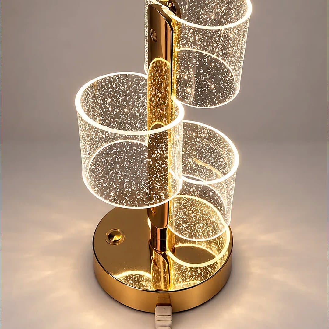 Lampe de chevet design dorée, cylindres transparents