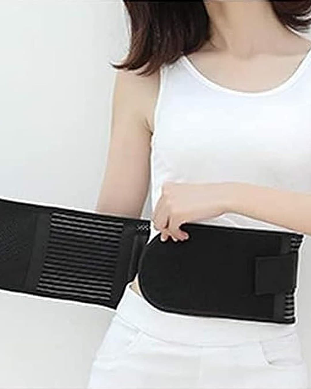 On enroule la ceinture lombaire autour de la taille